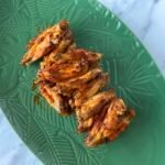 Plate of juicy chicken wings on a serving platter