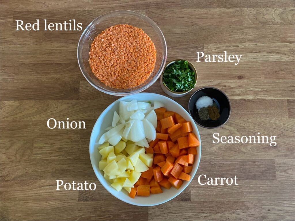 Ingredients for recipe: red lentils, parsley, seasonings, carrot, potato and onion