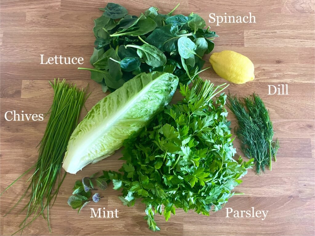 Ingredients for recipe: spinach, romaine lettuce, chives, mint, parsley, dill and lemon