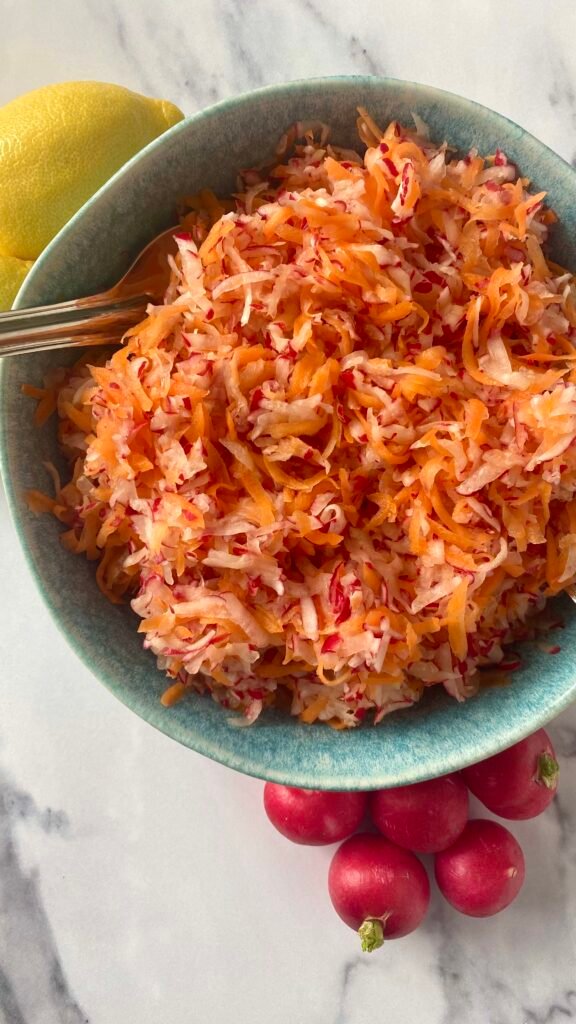 Radish and carrot salad served with lemon