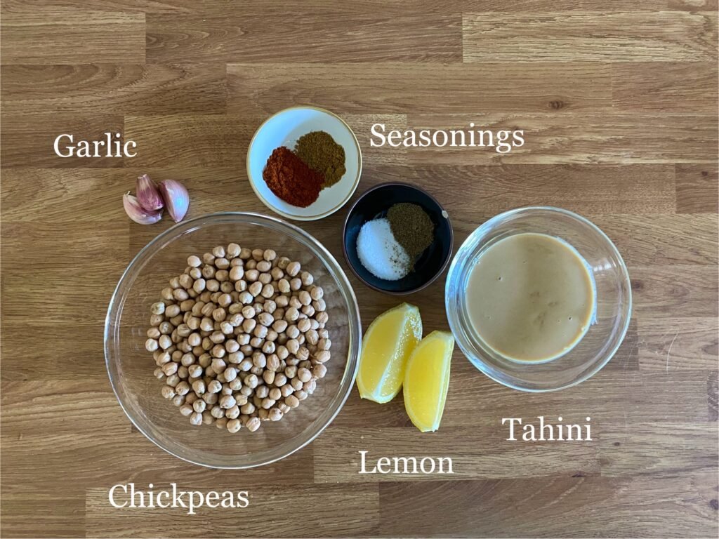 Ingredients for recipe: chickpeas, garlic, seasonings, lemon and tahini