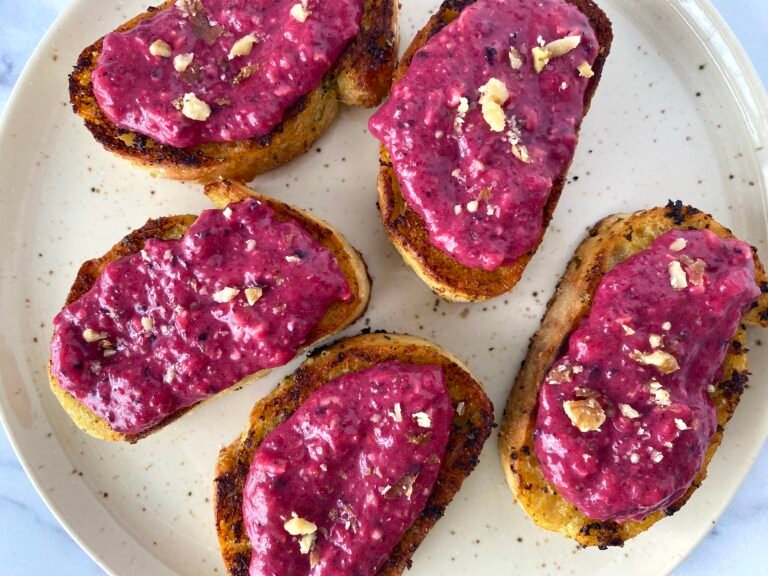 Beetroot hummus with no tahini or chickpeas, spread over toasted bread. Delicious and healthy Medierranean recipe.