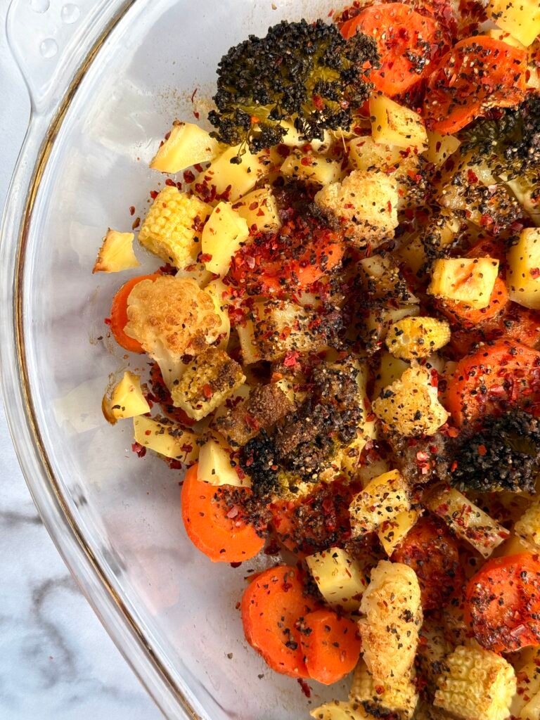 Healthy roasted vegetables recipe with cumin and chilli flakes – carrots, broccoli, cauliflower, baby sweetcorn and potatoes